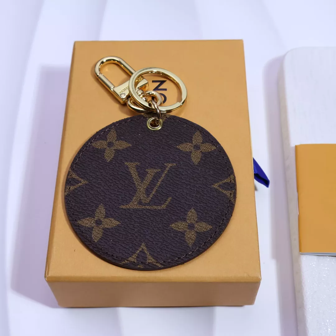 Louis Vuitton LV Key Holder And Bag Buckle Sleek 7096