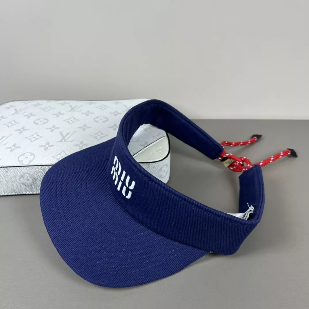 MIU MIU Caps Modern 9487
