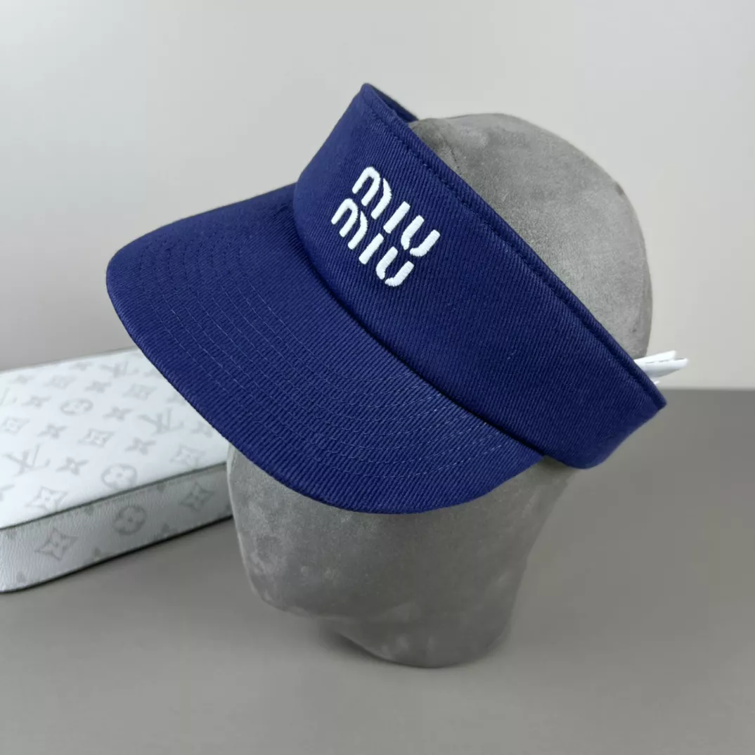 MIU MIU Caps Modern 9487