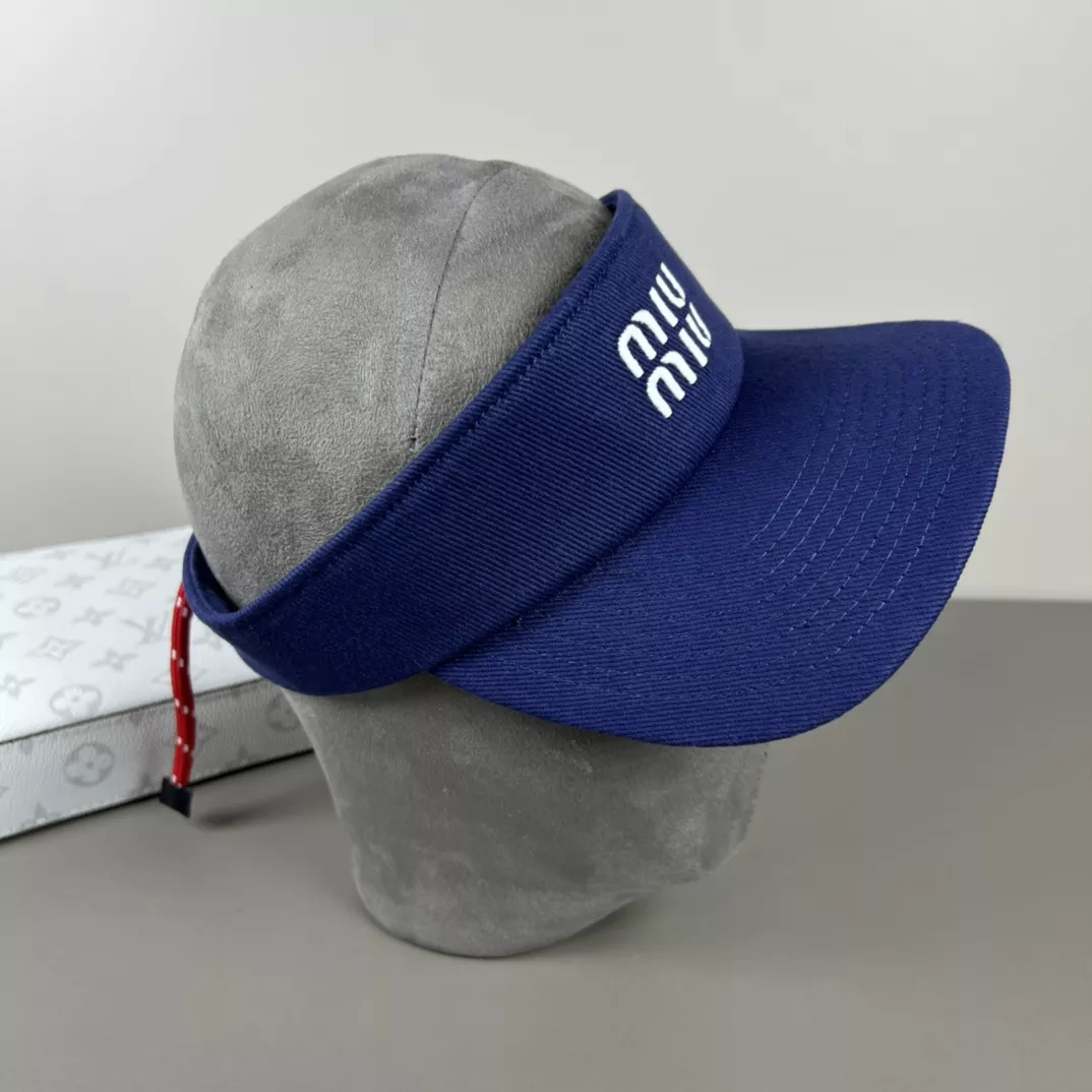 MIU MIU Caps Modern 9487