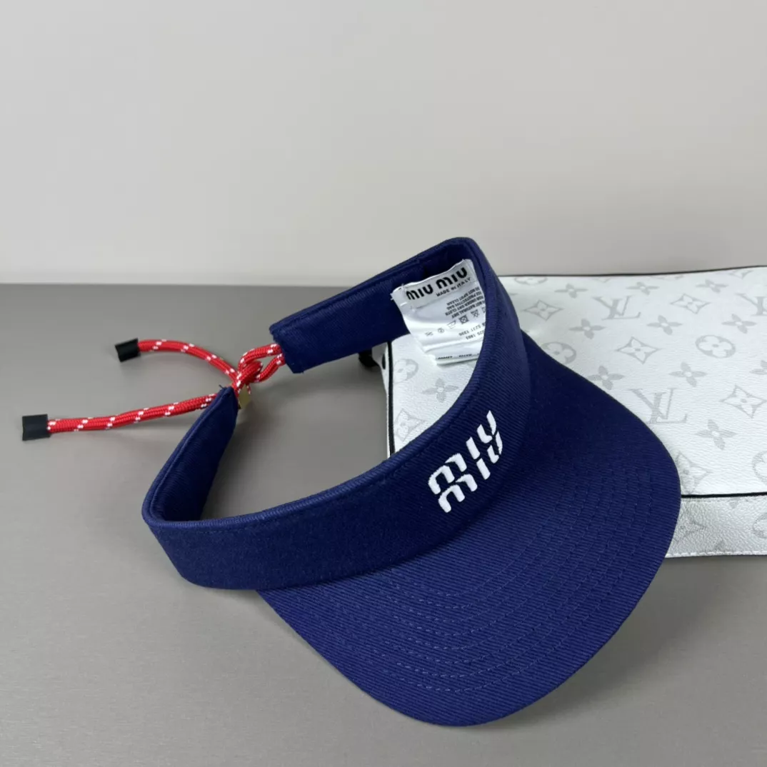 MIU MIU Caps Modern 9487