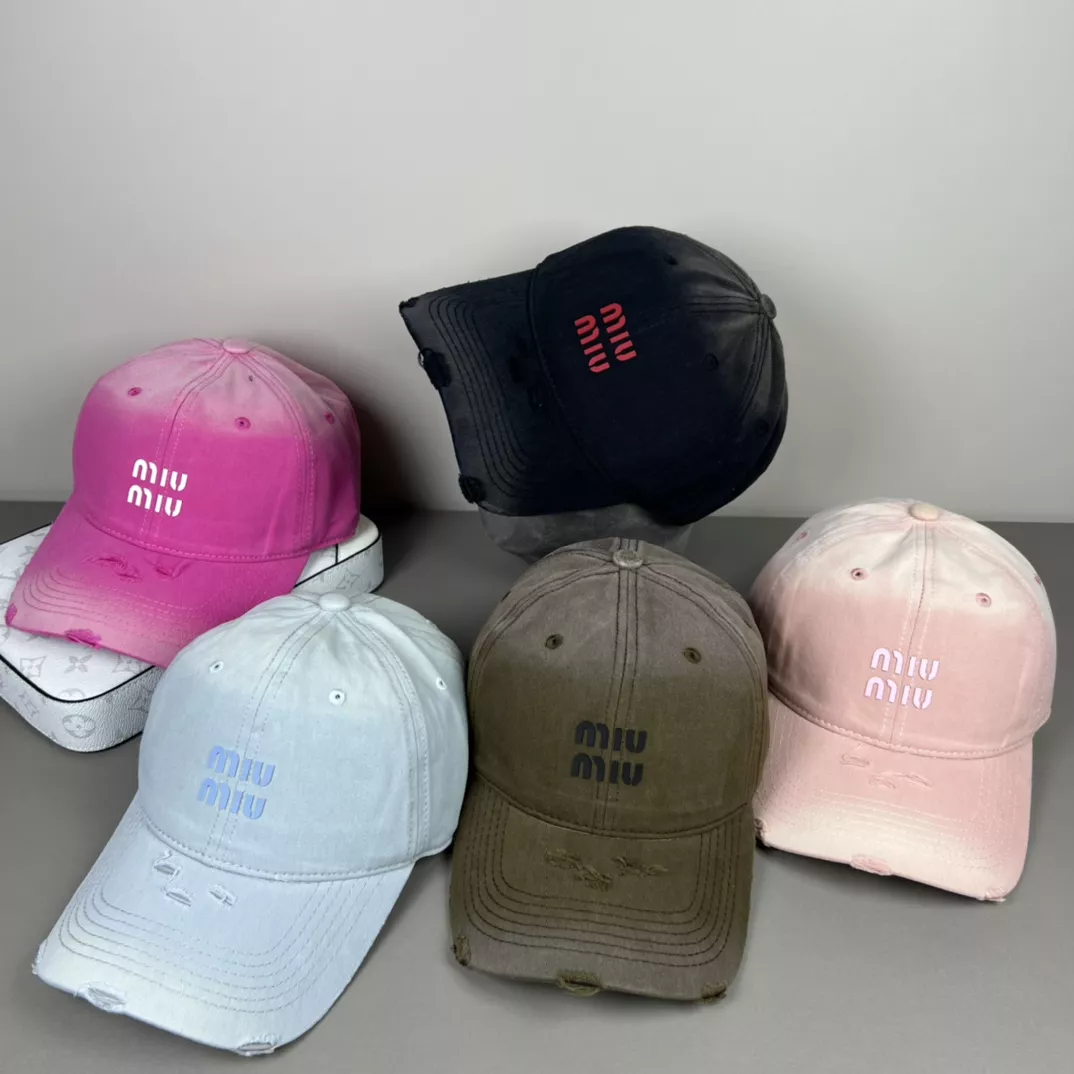 MIU MIU Caps Sleek 266