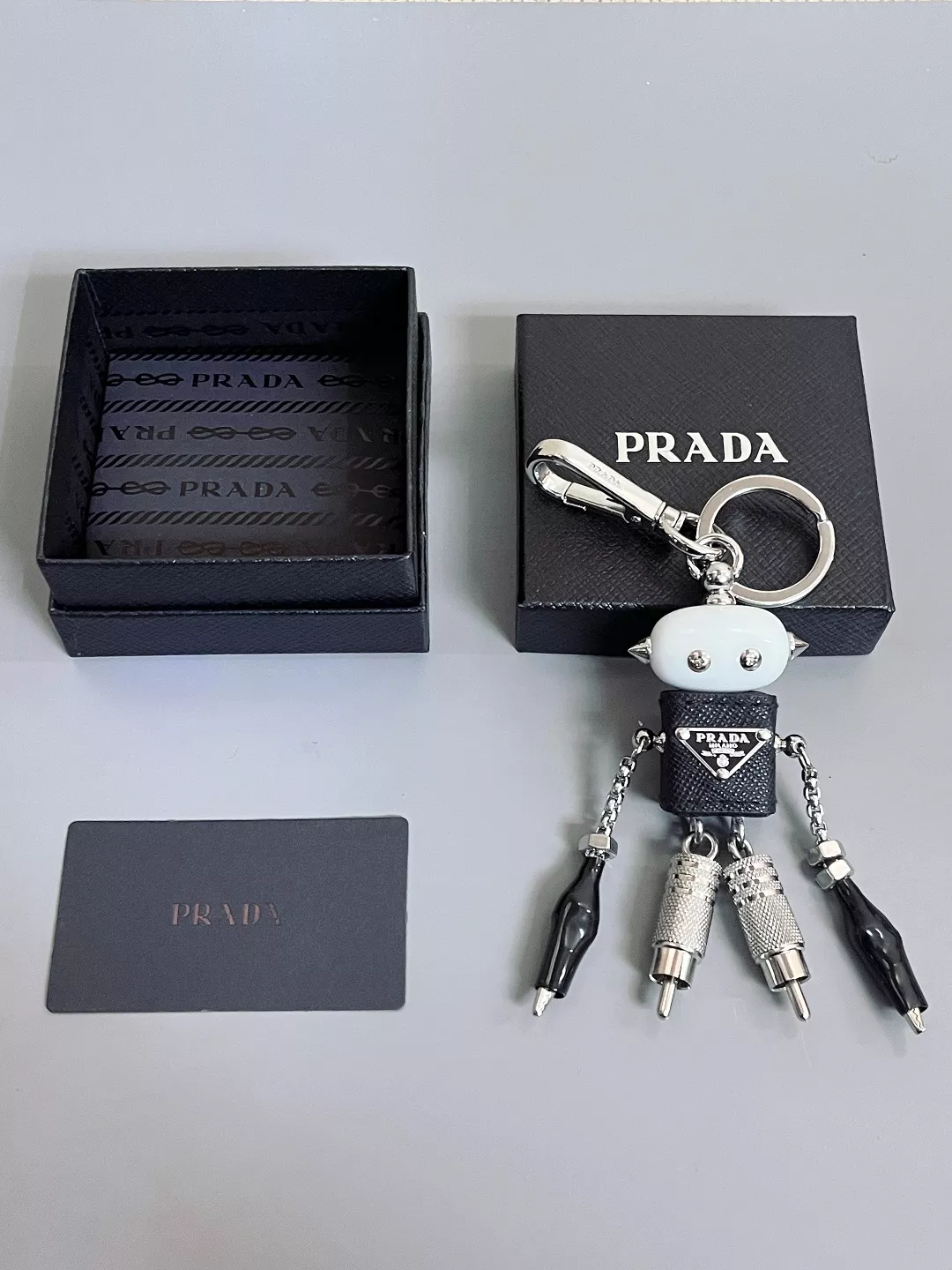 Prada Key Holder And Bag Buckle Bright 9178