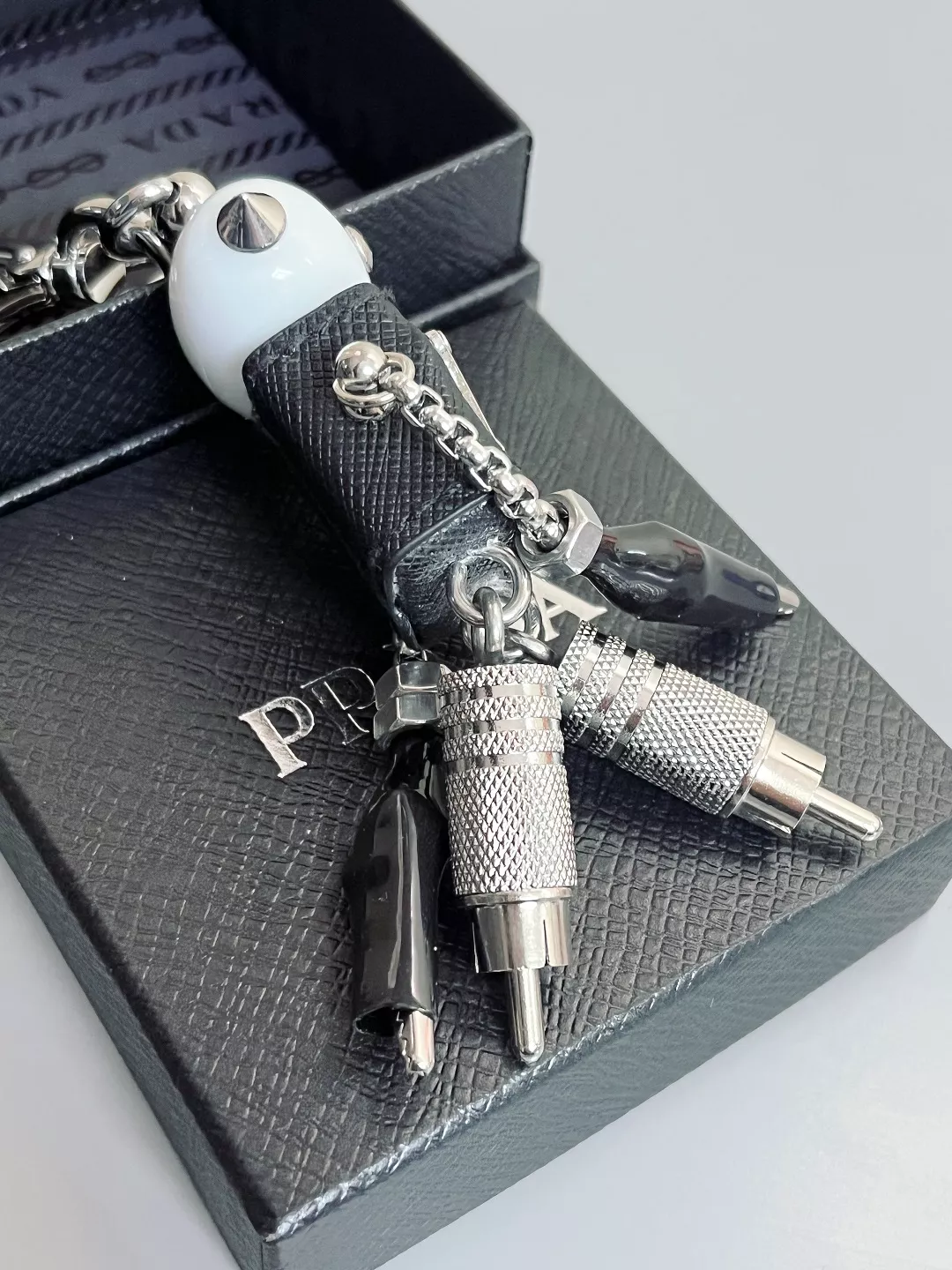 Prada Key Holder And Bag Buckle Bright 9178