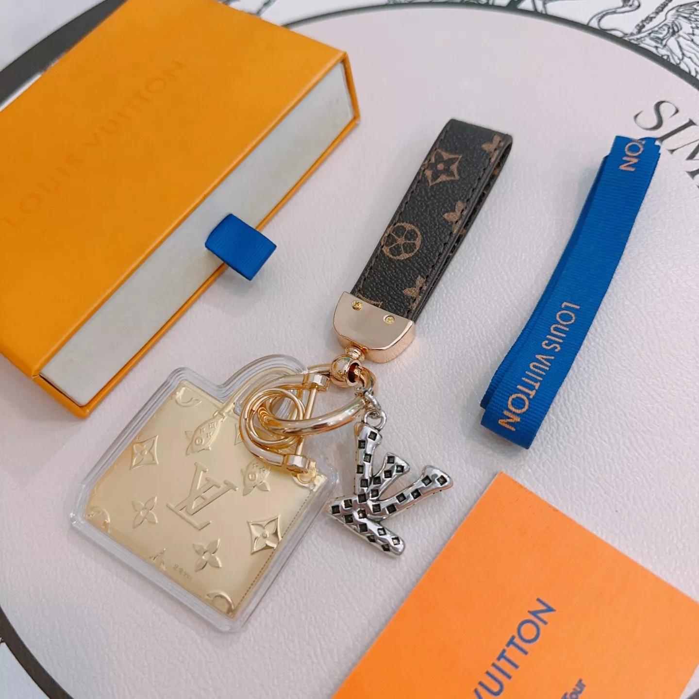 Vibrant 1789 Louis Vuitton LV Key Holder And Bag Buckle