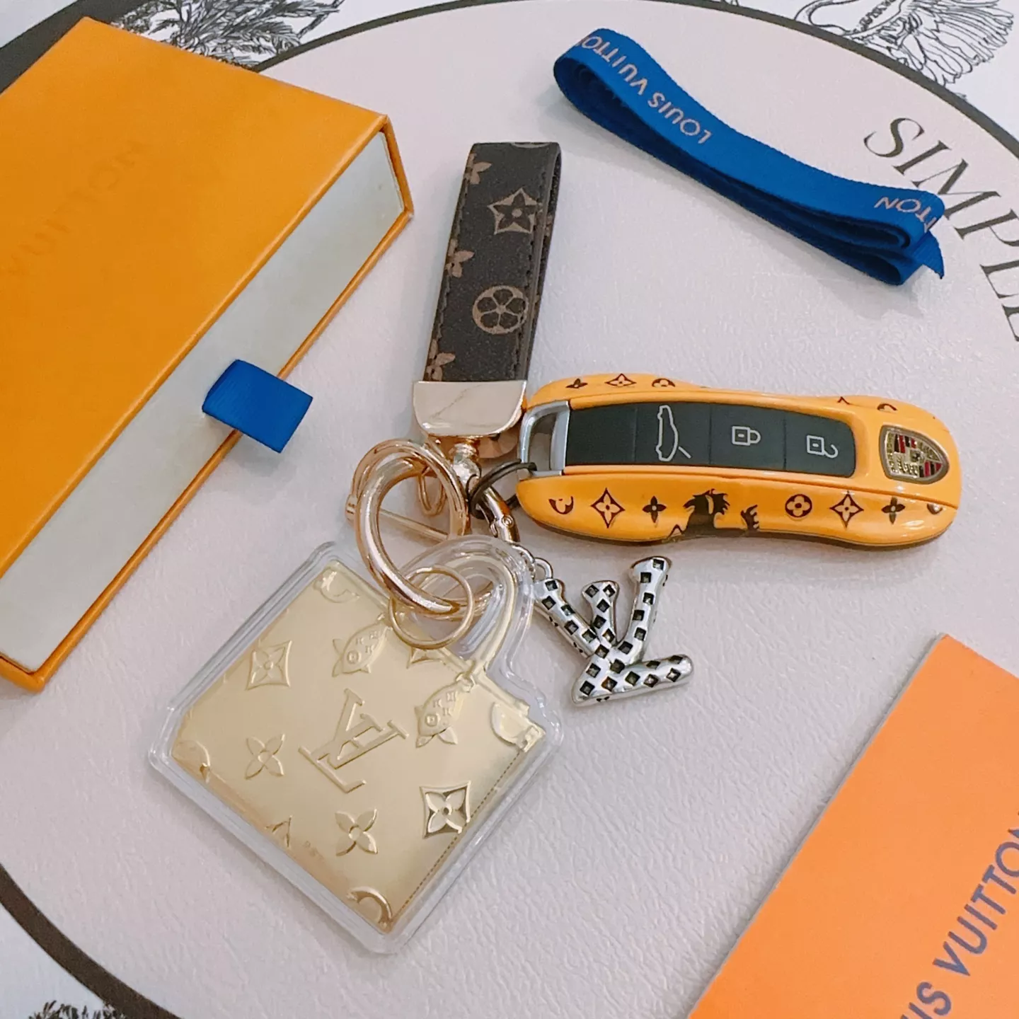 Vibrant 1789 Louis Vuitton LV Key Holder And Bag Buckle