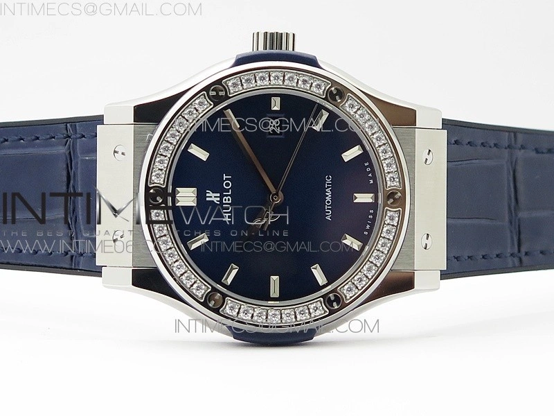 Classic Fusion 42mm SS Paved Diamonds Bezel B50F Blue Dial On Blue Gummy Strap A2892