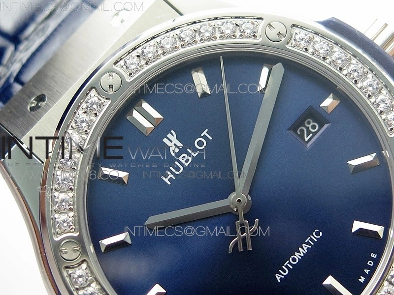 Classic Fusion 42mm SS Paved Diamonds Bezel B50F Blue Dial On Blue Gummy Strap A2892