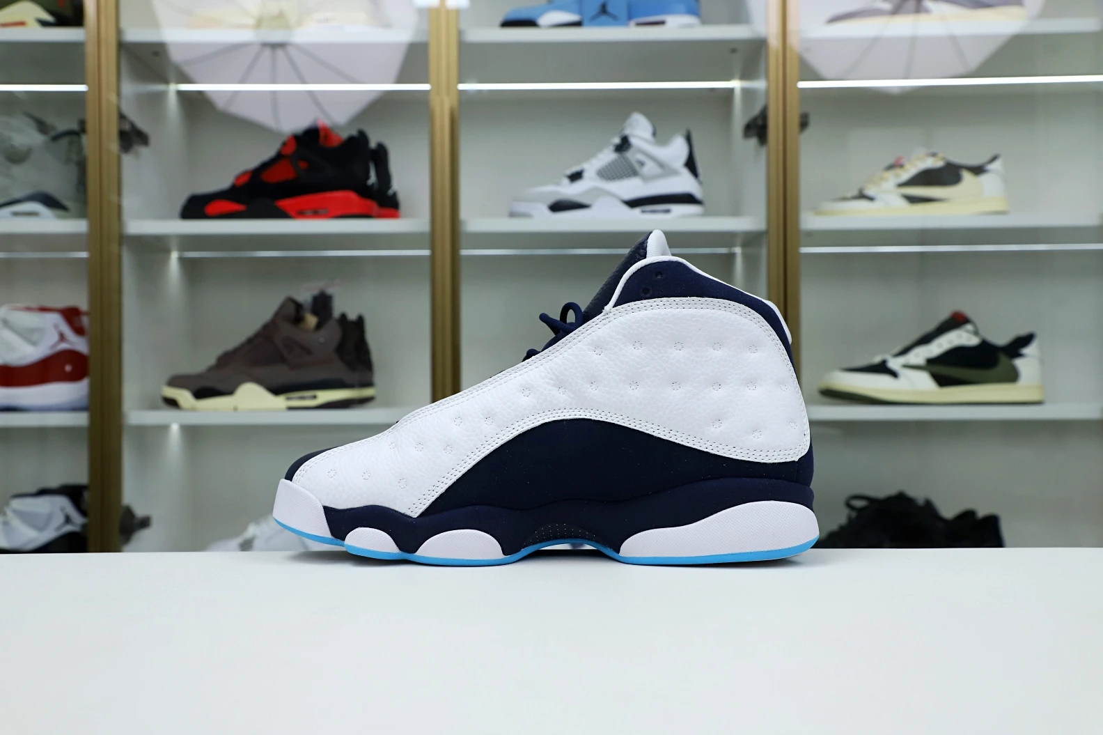 Kimikick AIR JORDAN 13 RETRO WHITE OBSIDIAN POWDER BLUE 414571- SportInspired 1937
