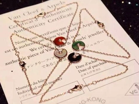 Amulette de Cartier 7 Color Stones Bracelet in Yellow Gold, White Gold and Pink Gold