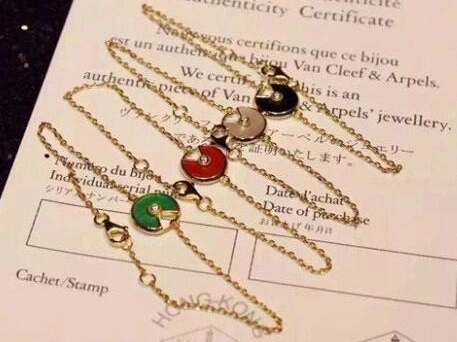 Amulette de Cartier 7 Color Stones Bracelet in Yellow Gold, White Gold and Pink Gold