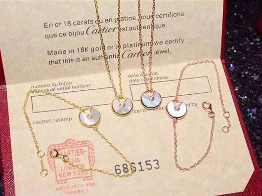 Amulette de Cartier 7 Color Stones Bracelet in Yellow Gold, White Gold and Pink Gold