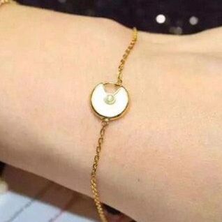 Amulette de Cartier 7 Color Stones Bracelet in Yellow Gold, White Gold and Pink Gold