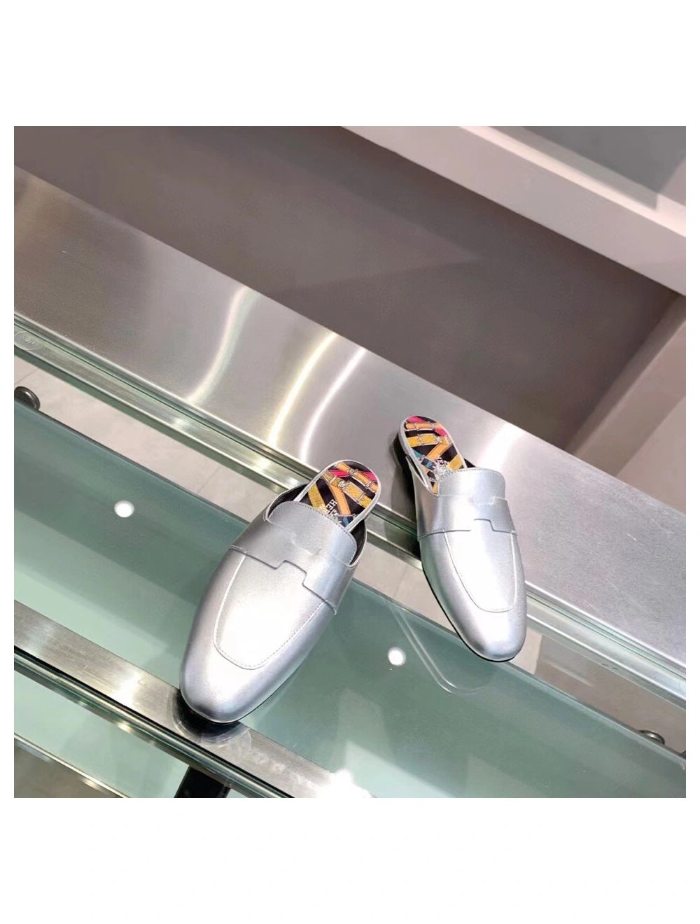 Hermes Catena Mules In Silver Metallic Calfskin