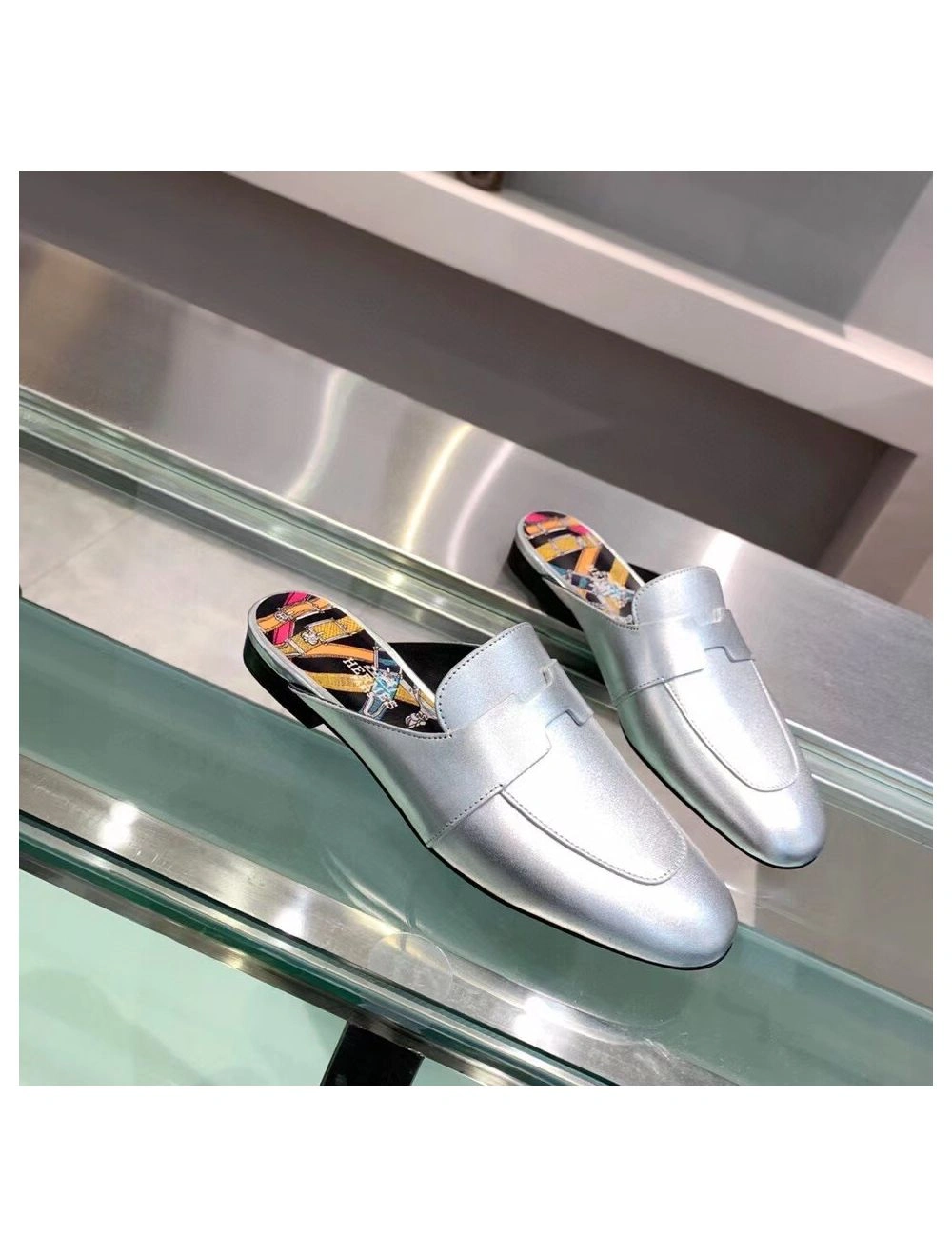 Hermes Catena Mules In Silver Metallic Calfskin