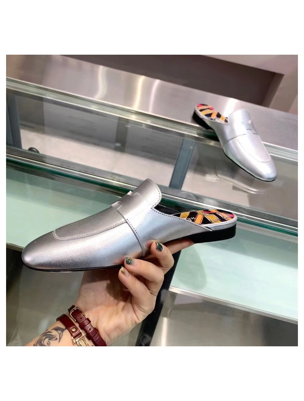 Hermes Catena Mules In Silver Metallic Calfskin