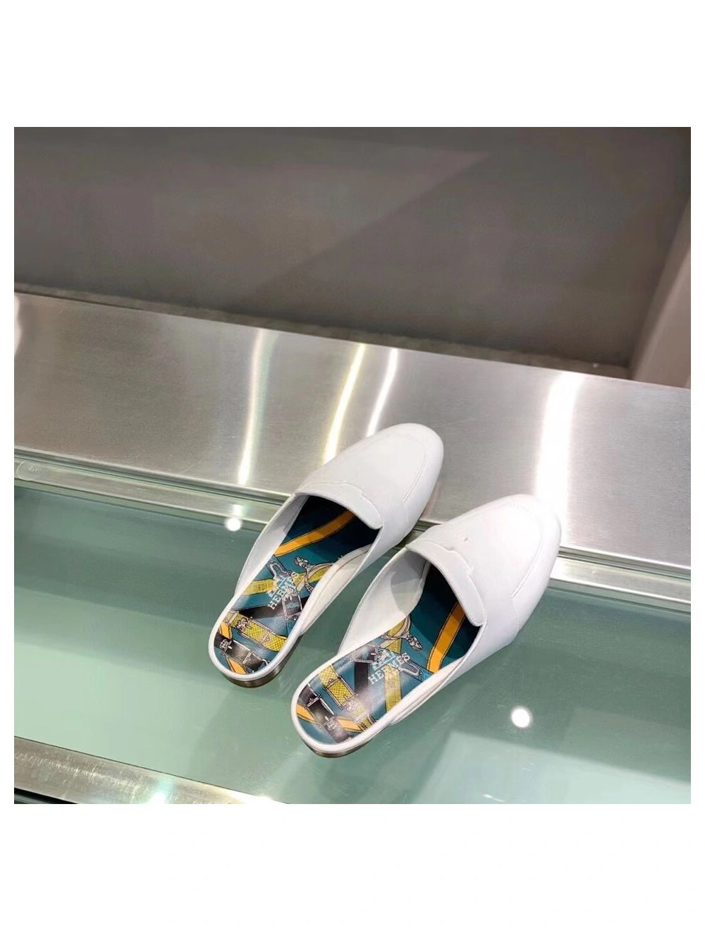 Hermes Catena Mules In White Calfskin