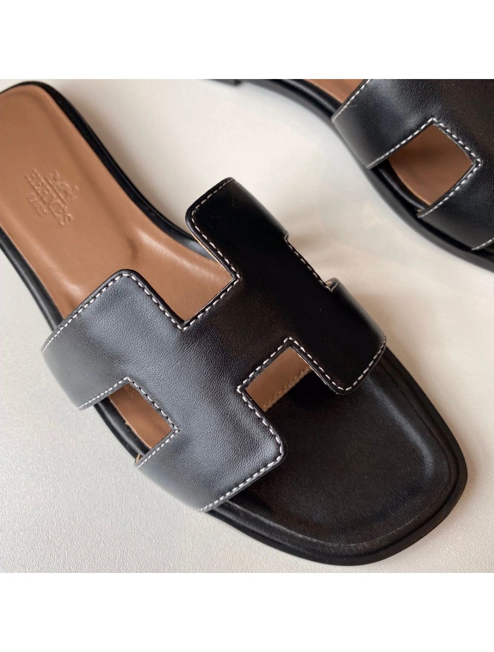 Hermes Oran Slide Sandals In Black Swift Calfskin