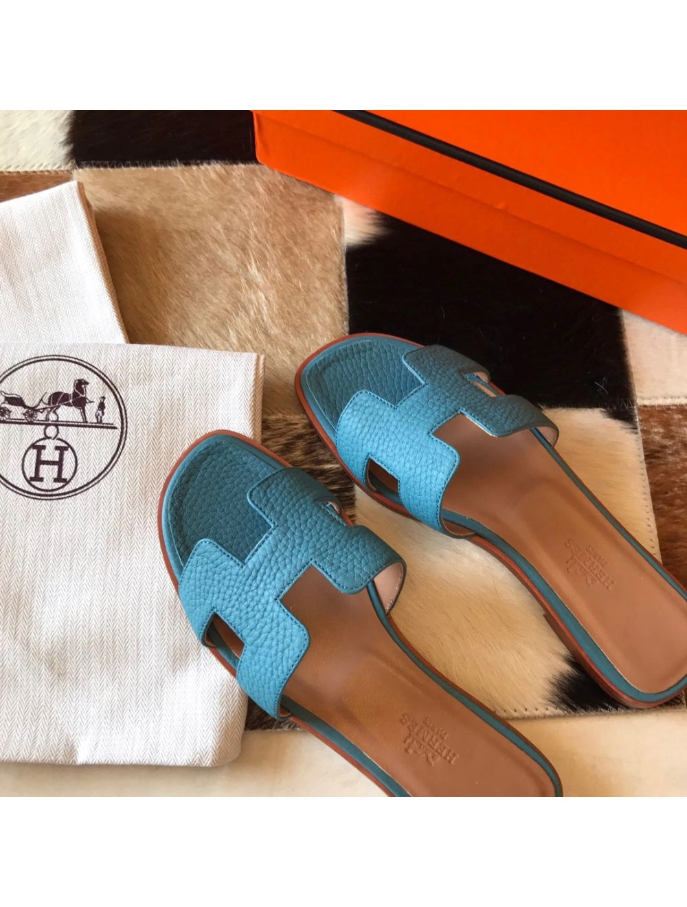 Hermes Oran Slide Sandals In Blue Jean Clemence Leather
