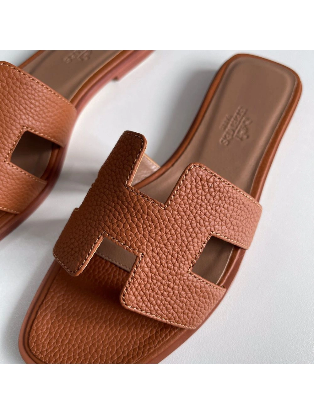 Hermes Oran Slide Sandals In Gold Clemence Leather