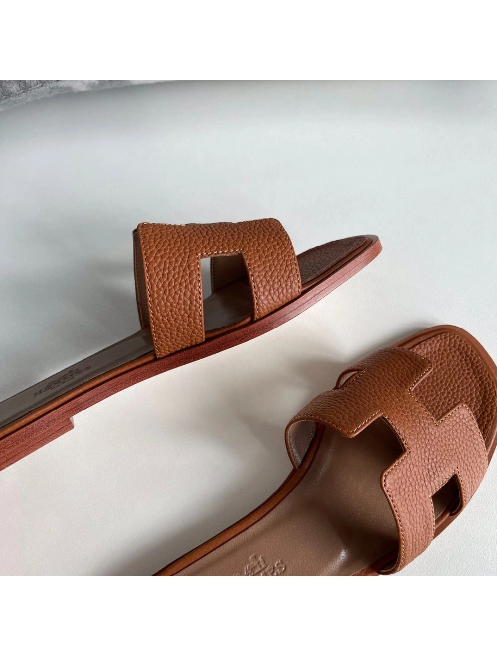 Hermes Oran Slide Sandals In Gold Clemence Leather