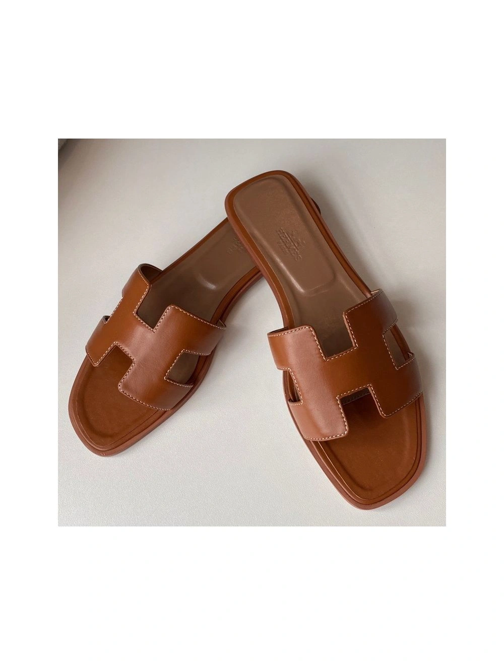 Hermes Oran Slide Sandals In Gold Swift Calfskin