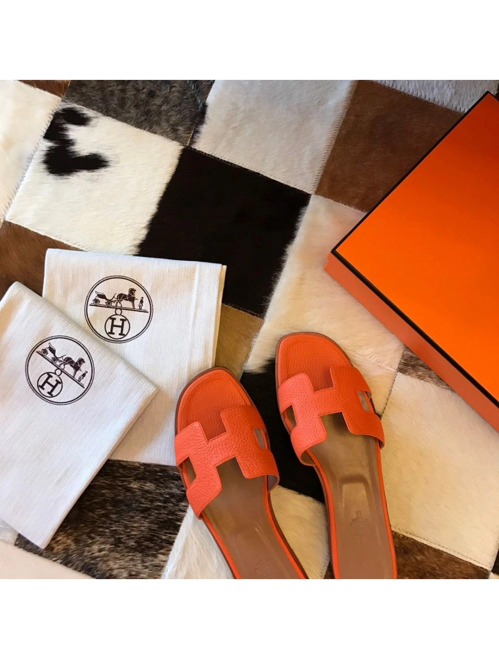 Hermes Oran Slide Sandals In Orange Clemence Leather