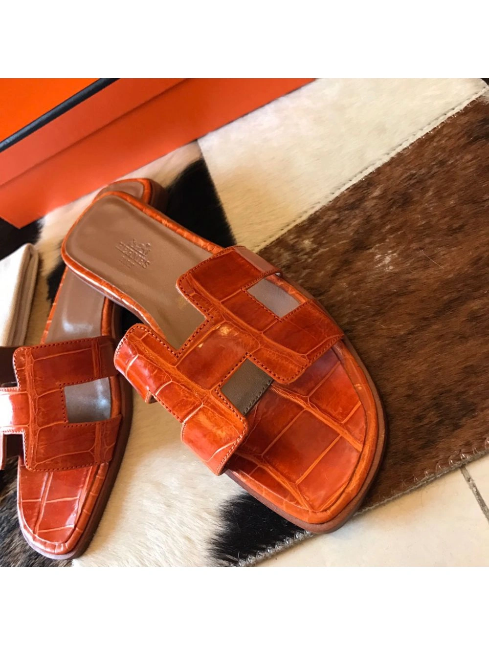 Hermes Oran Slide Sandals In Orange Shiny Niloticus Crocodile Skin