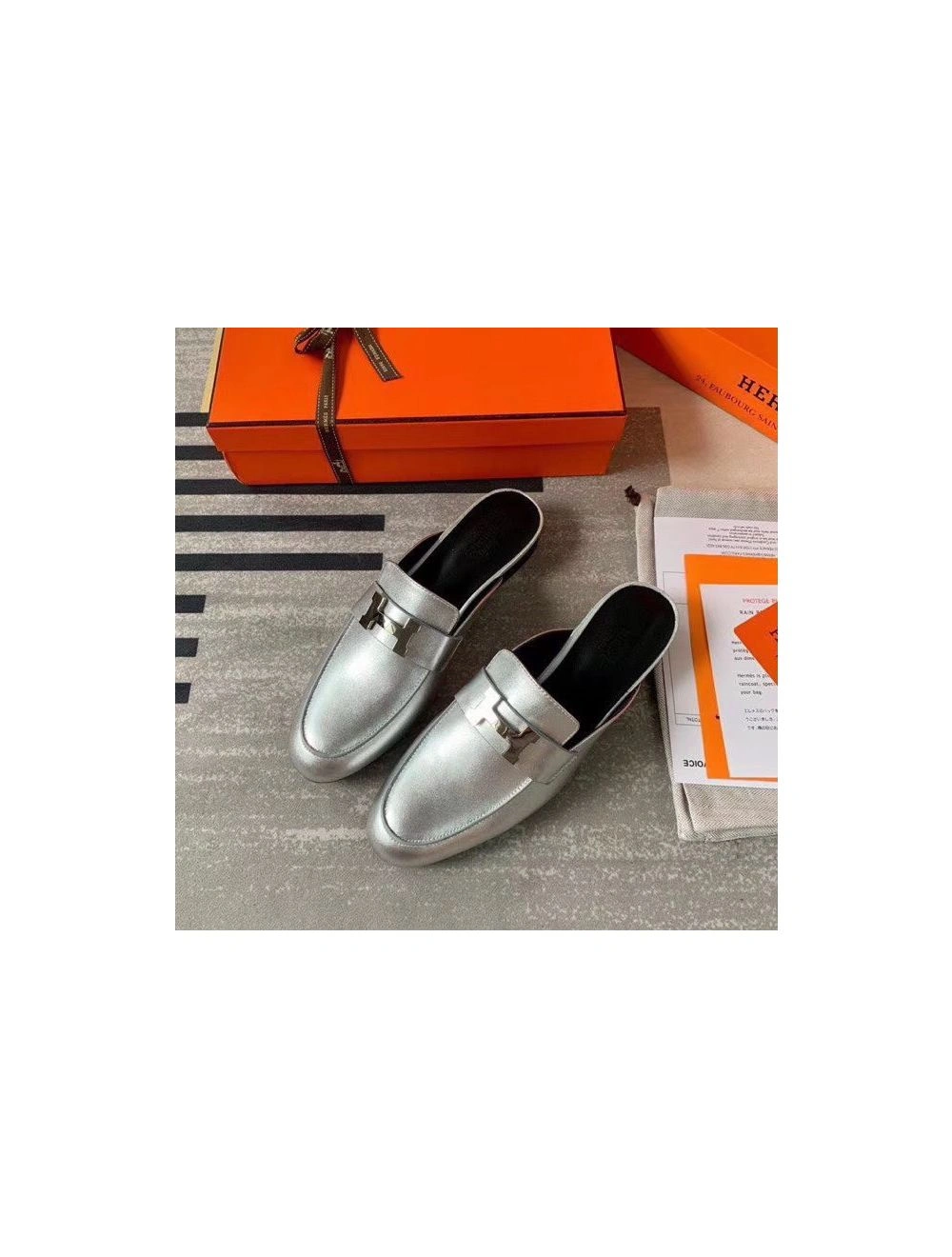 Hermes Trocadero Mules In Silver Nappa Leather