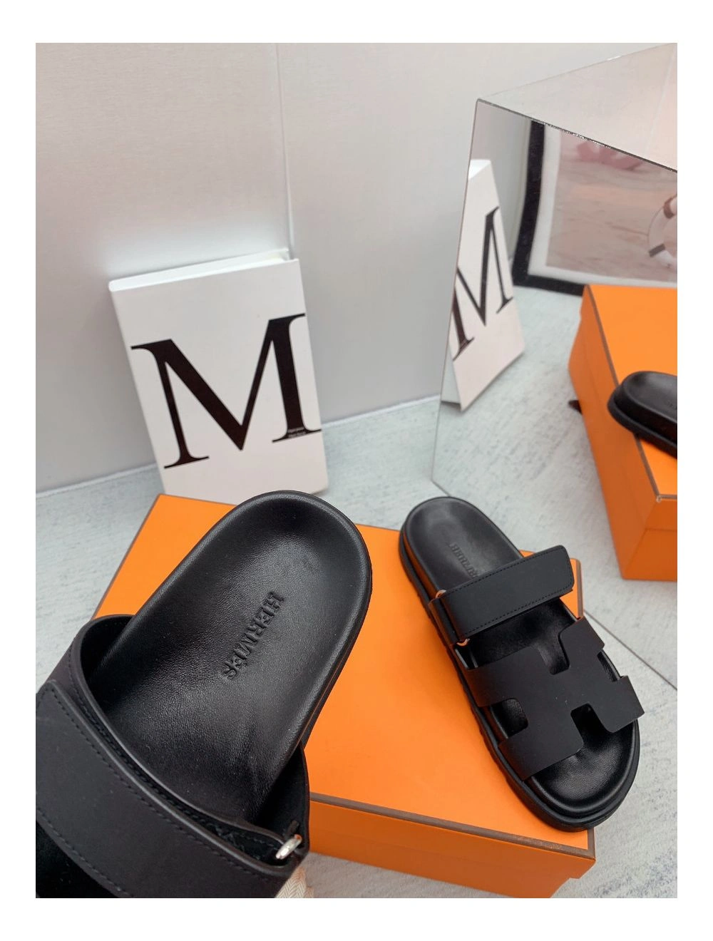 Hermes Women’s Chypre Sandals In Black Calfskin