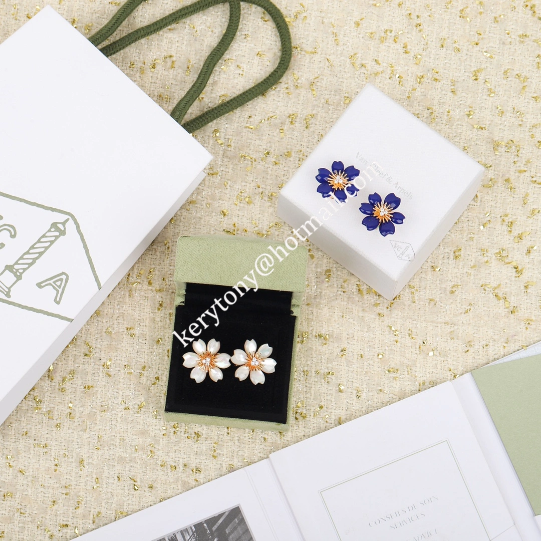 Hot Selling Van Cleef Arpels Rose de Noel Clip Earrings White Blue With Diamonds Replica