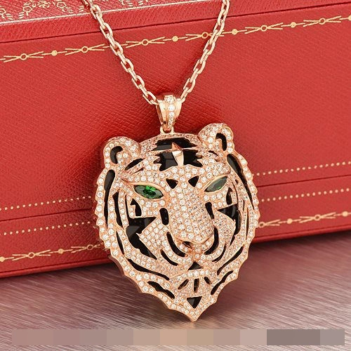 Panthere De Cartier Leopard Head Pendant In Pink Gold With Emeralds And Diamonds