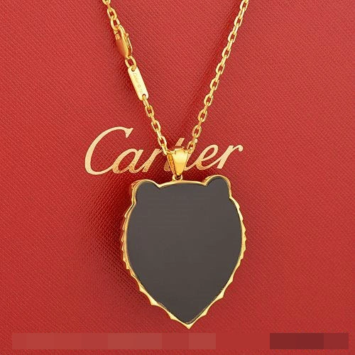 Panthere De Cartier Leopard Head Pendant In Yellow Gold With Emeralds And Diamonds