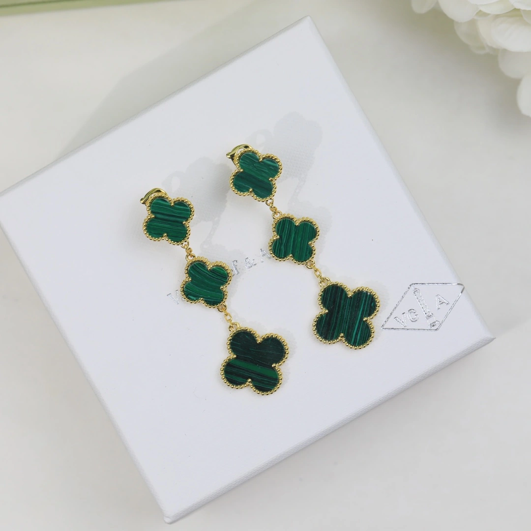 Van Cleef & Arpels Magic Alhambra Earrings 3 Motifs Yellow Gold in Malachite