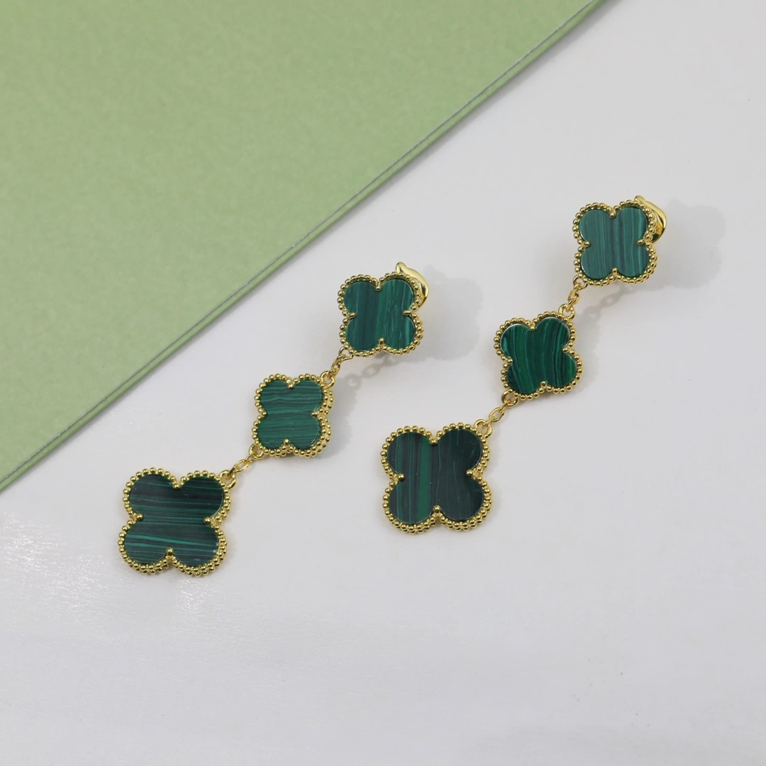 Van Cleef & Arpels Magic Alhambra Earrings 3 Motifs Yellow Gold in Malachite