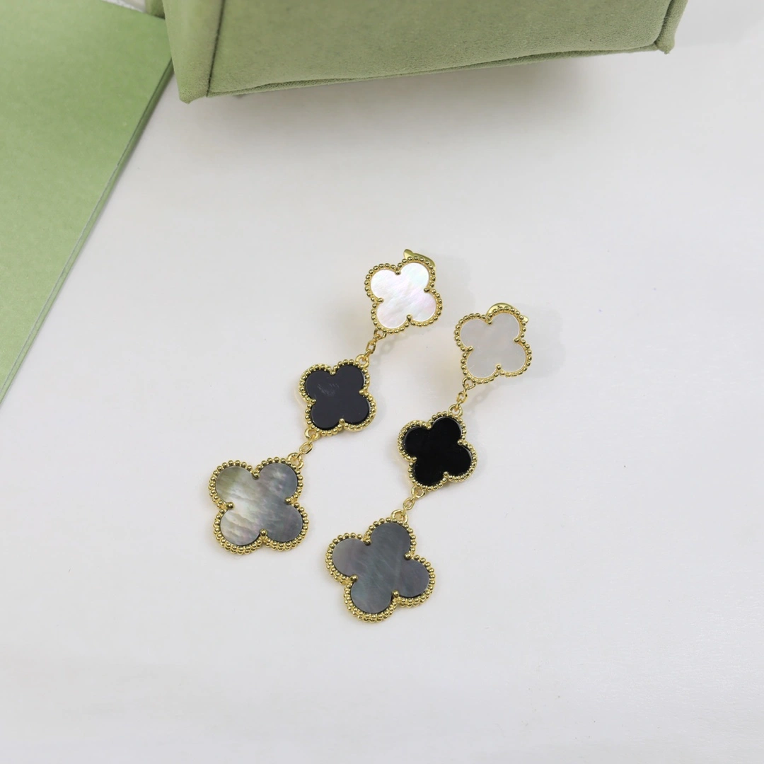 Van Cleef & Arpels Magic Alhambra Earrings 3 Motifs Yellow Gold in White and Gray mother-of-pearl and Onyx