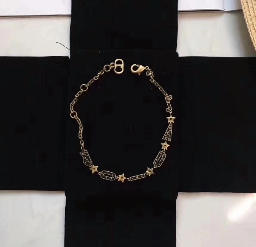 Vintage Style Christian Dior Jadior Black Logo Motif-Yellow Brass Star Womens Bracelet Price USA Replica