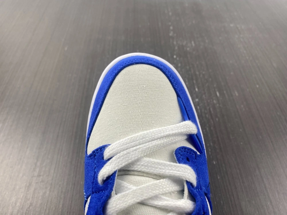Dunk Low Disrupt 2 White University Blue DH4402- Versatile 374