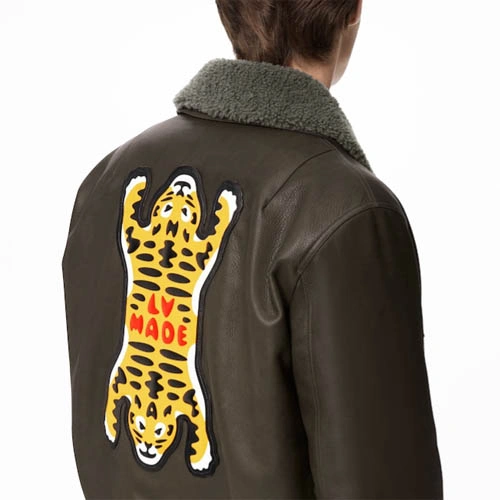 1A9K3M Tiger patterned leather belted jacket