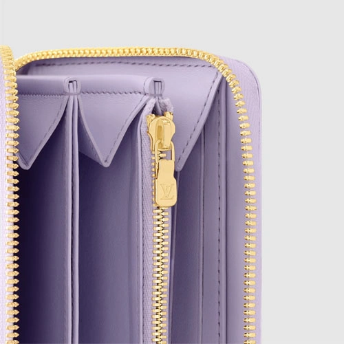 M82977 Zippy Wallet Glossy Lilac
