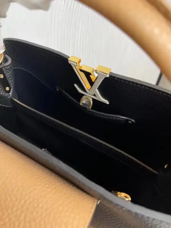 First bag ru Louis Vuitton CAPUCINES MM