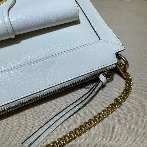 First bag ru GUCCI Small shoulder bag with Double G