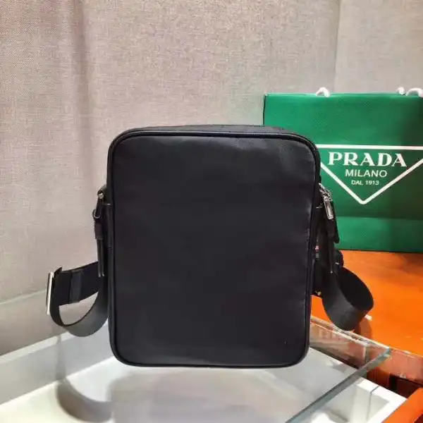 First bag ru PRADA Re-Nylon and Saffiano leather shoulder bag