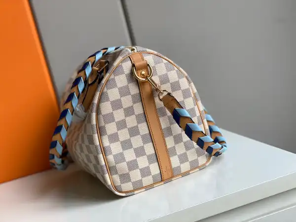 First bag ru LOUIS VUITTON SPEEDY BANDOULIÈRE 30