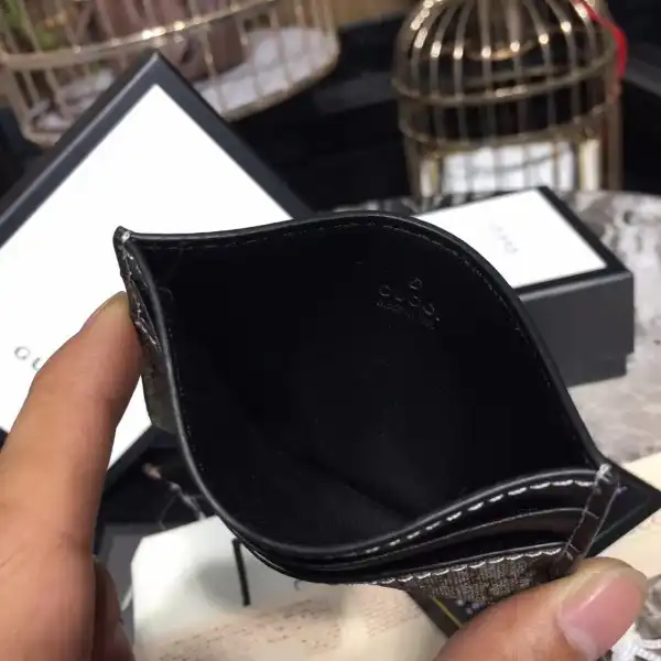 First bag ru Gucci Card holder