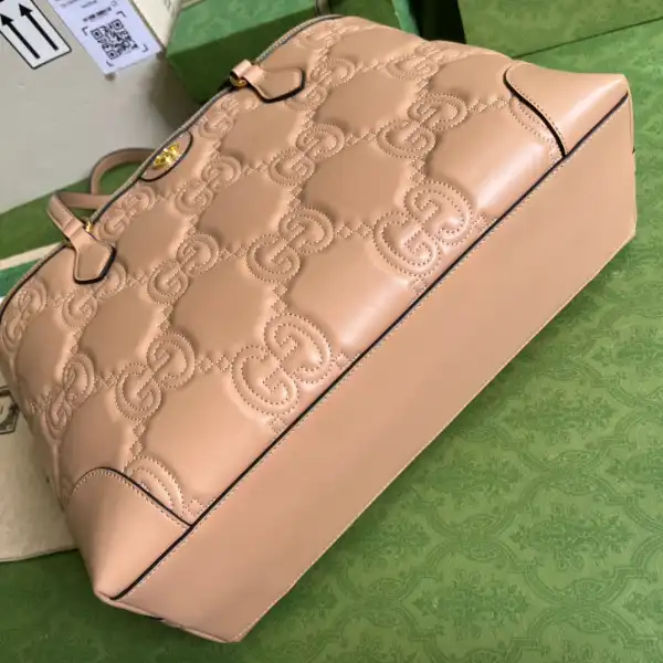 First bag ru GUCCI GG matelassé leather medium tote