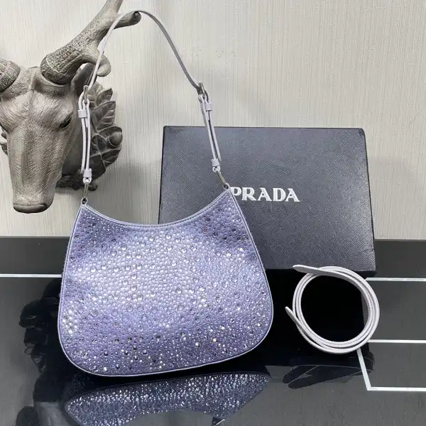 First bag ru PRADA CHANELeo satin bag with appliqués