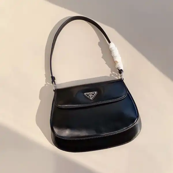 First bag ru PRADA CHANELeo brushed leather shoulder bag with flap