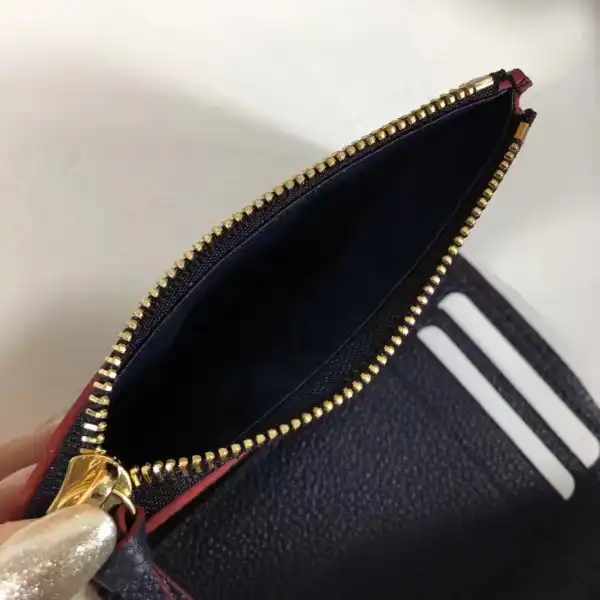 TO Louis Vuitton Victorine wallet