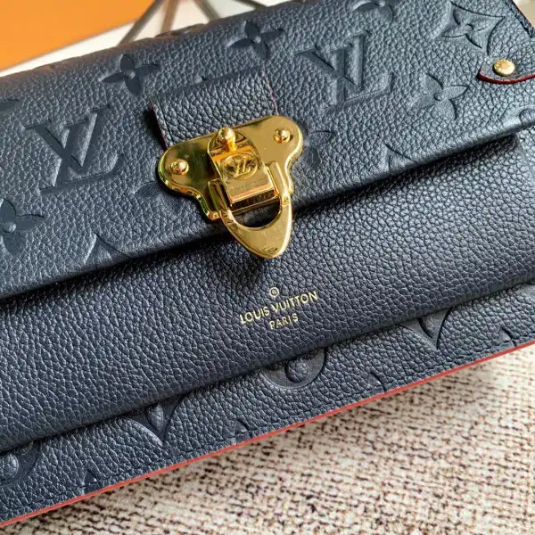 First bag ru LOUIS VUITTON VAVIN CHAIN WALLET